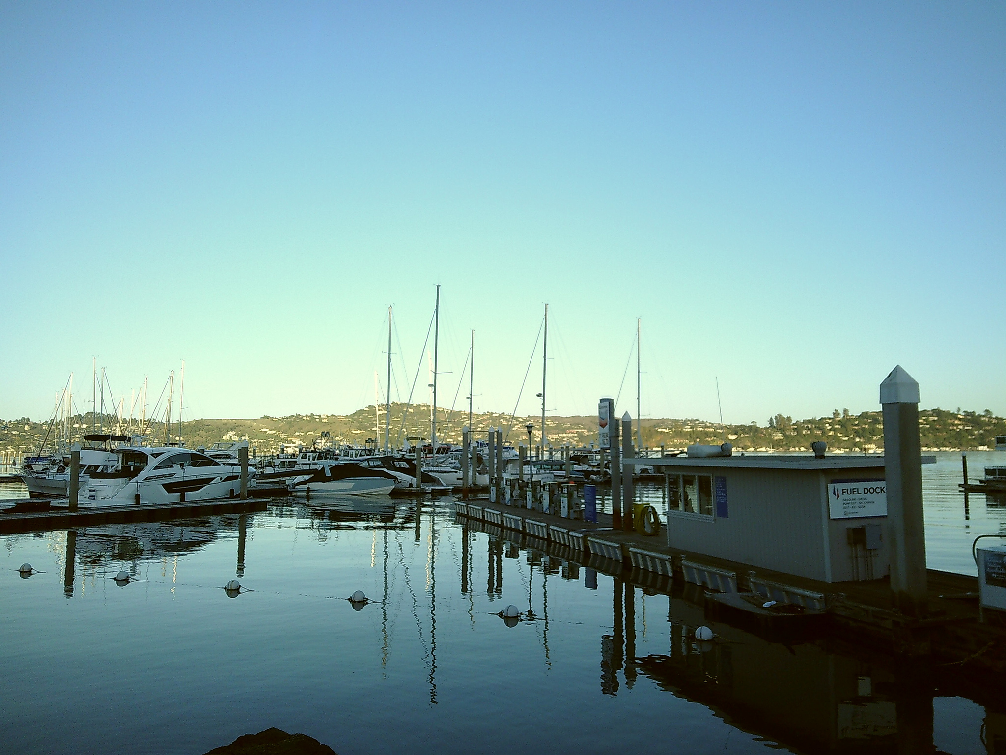 Photo of a dock with boats parked