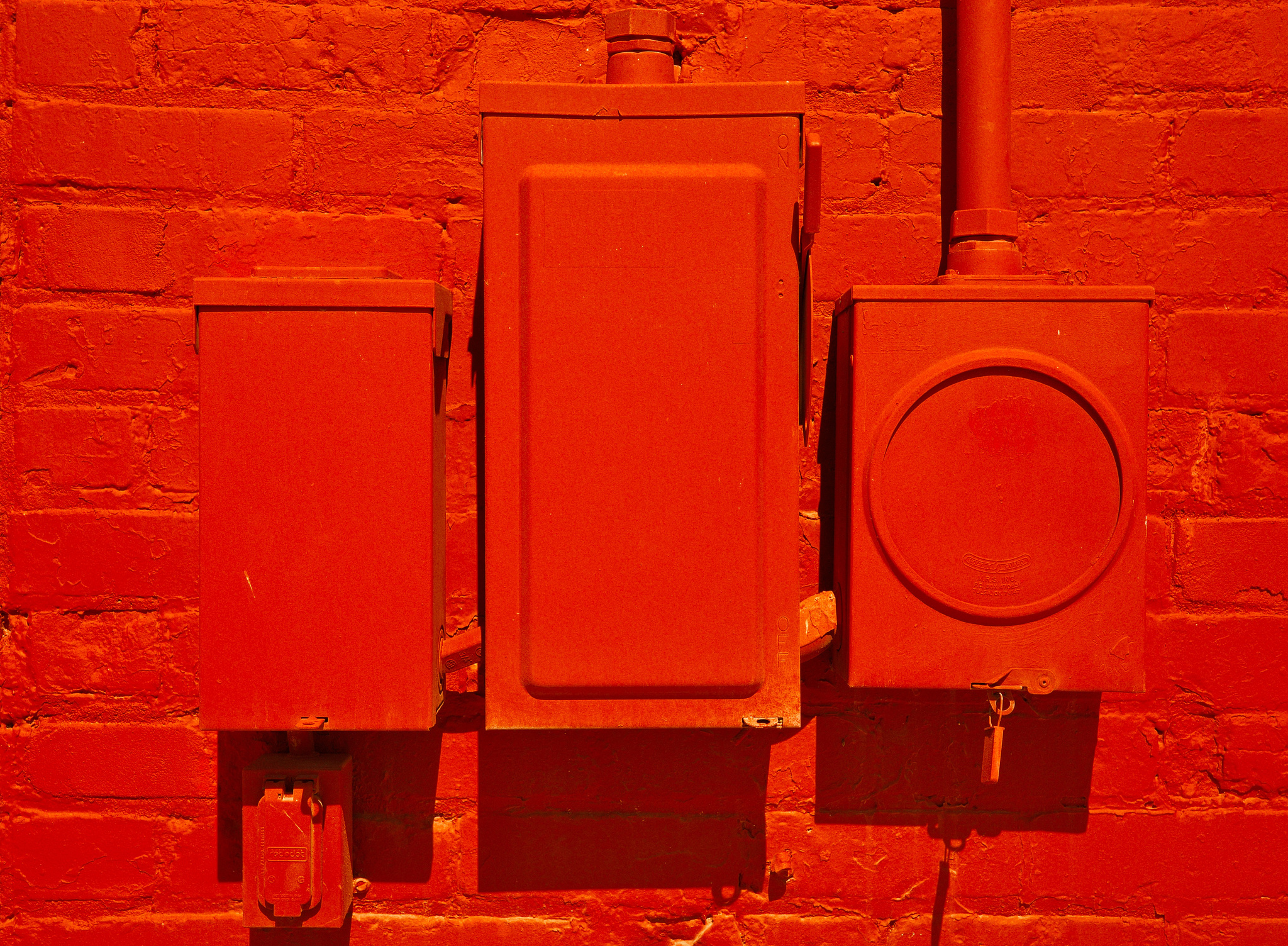 Red on Red Brick Wall